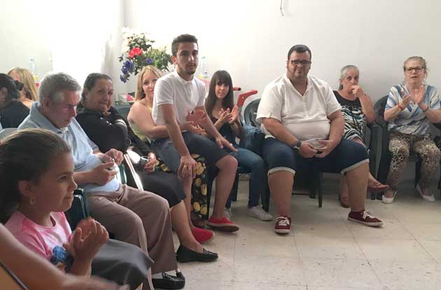 European christians gather together in a cirle to worship