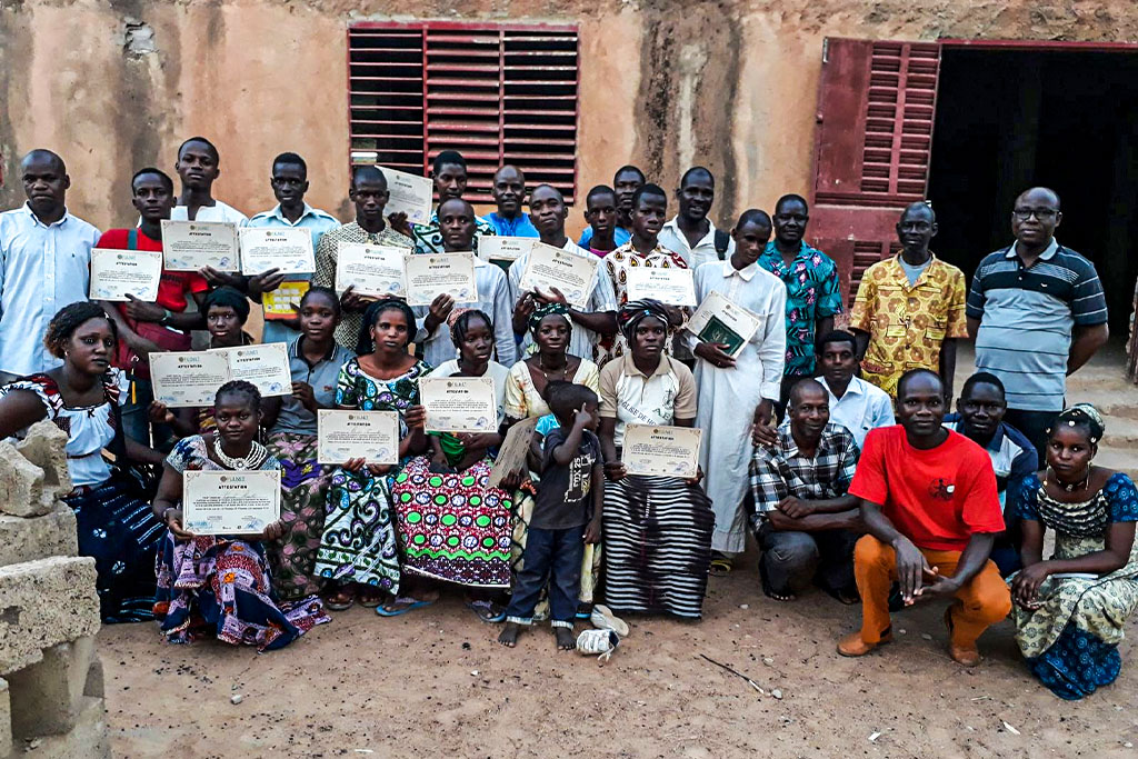 Sierra Leonean young adults holding their certificates of education