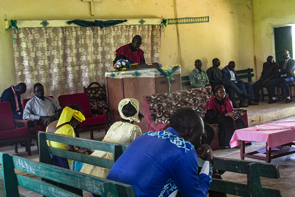 Christian pastor preaches from the pulpit to Chadian Christians