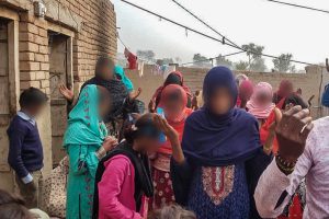 Pakistani christians raise hands and worship God together