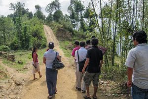 Nepalese Christians walking down a dirt road