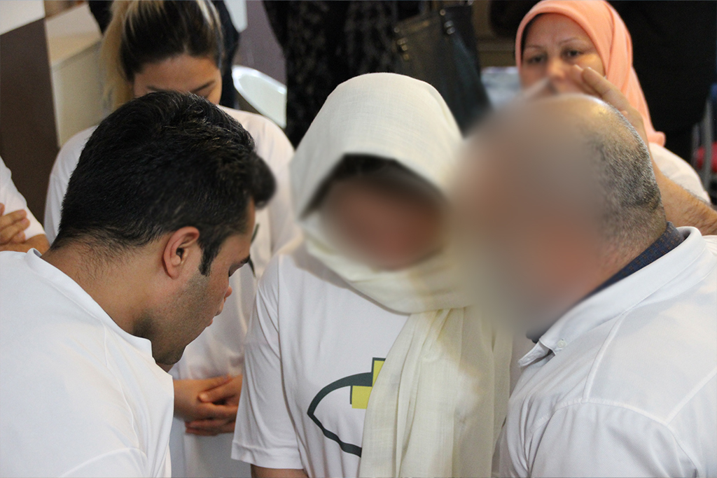 Christians in Turkey pray together in a small group