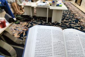 An open bible written in Arabic